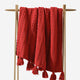 Braided Pom Pom Throw Rouge