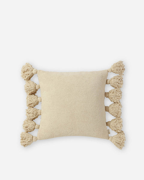 https://sundaycitizen.co/cdn/shop/files/Sunday-Citizen_Pom-Pom-Throw-Pillow_Sahara-Tan_1_grande.jpg?v=1694103759