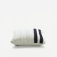 Sunday Citizen Braided Snug two tones Lite Throw Pillow in White - Midnight close-up of soft fabric texture