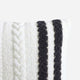 Sunday Citizen Braided Snug two tones Lite Throw Pillow in White - Midnight close-up of soft fabric texture