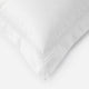 Sunday Citizen Luce Cotton Sateen Sham Set in White, close-up of soft fabric texture