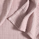 Sunday Citizen Muslin Throw in Dusty Rose close-up of soft fabric texture