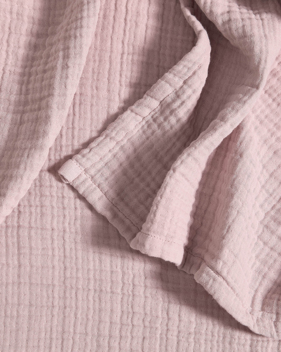 Sunday Citizen Muslin Throw in Dusty Rose close-up of soft fabric texture