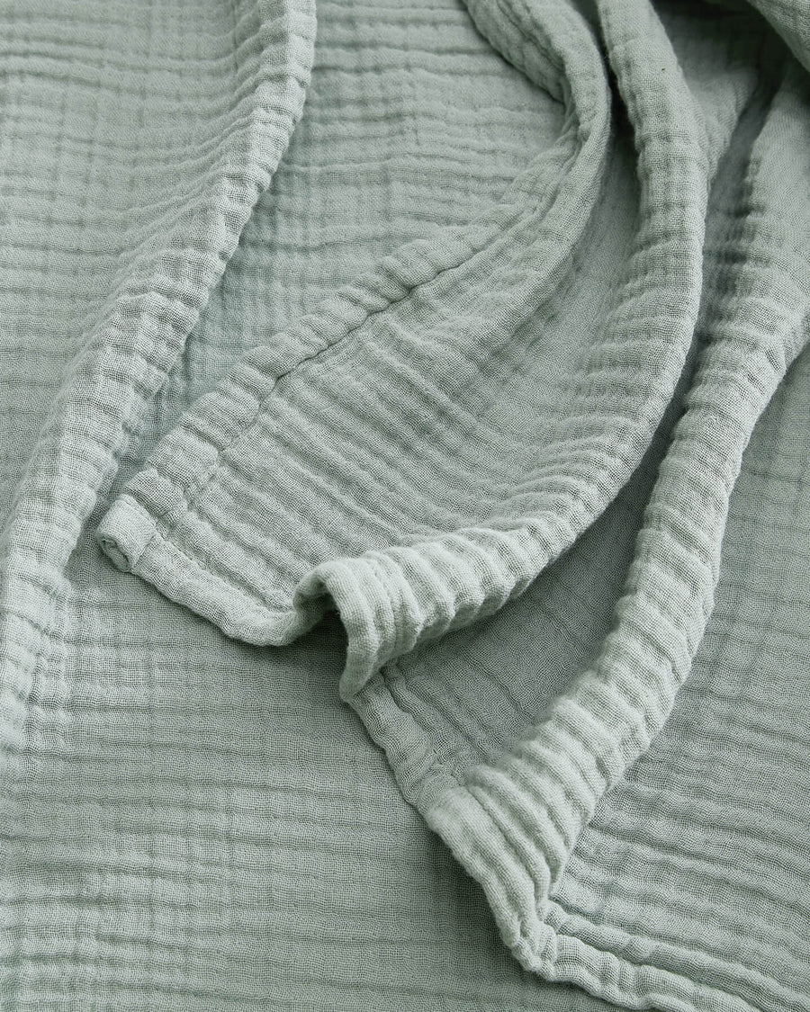 Sunday Citizen Muslin Throw in Jade  close-up of soft fabric texture