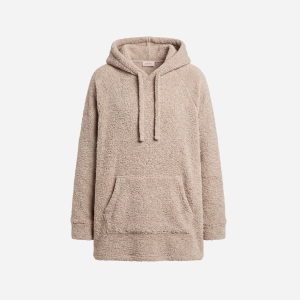 A beige sherpa fleece pullover hoodie with a drawstring hood and kangaroo pocket, shown against a plain light gray background.