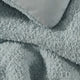 Sunday Citizen Snug Comforter in Misty Blue close-up of soft fabric texture