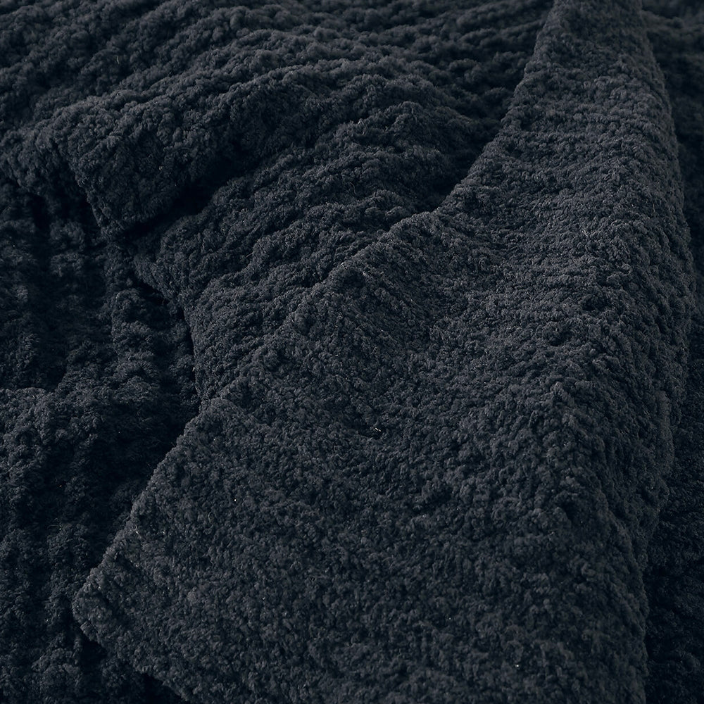 Sunday Citizen Snug Waffle Throw in Black close-up of soft fabric texture