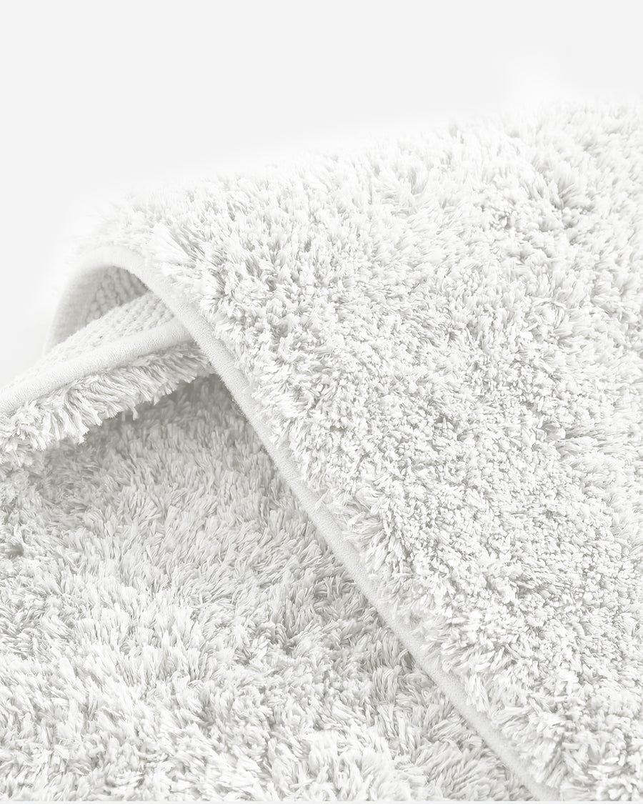Sunday Citizen Spa Cotton Rug in Clear White close-up of soft fabric texture 