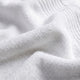 Sunday Citizen Spa Cotton Towel Set in Clear White close-up of soft fabric texture