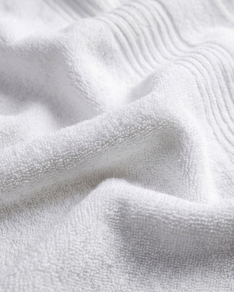 Sunday Citizen Spa Cotton Towel Set in Clear White close-up of soft fabric texture